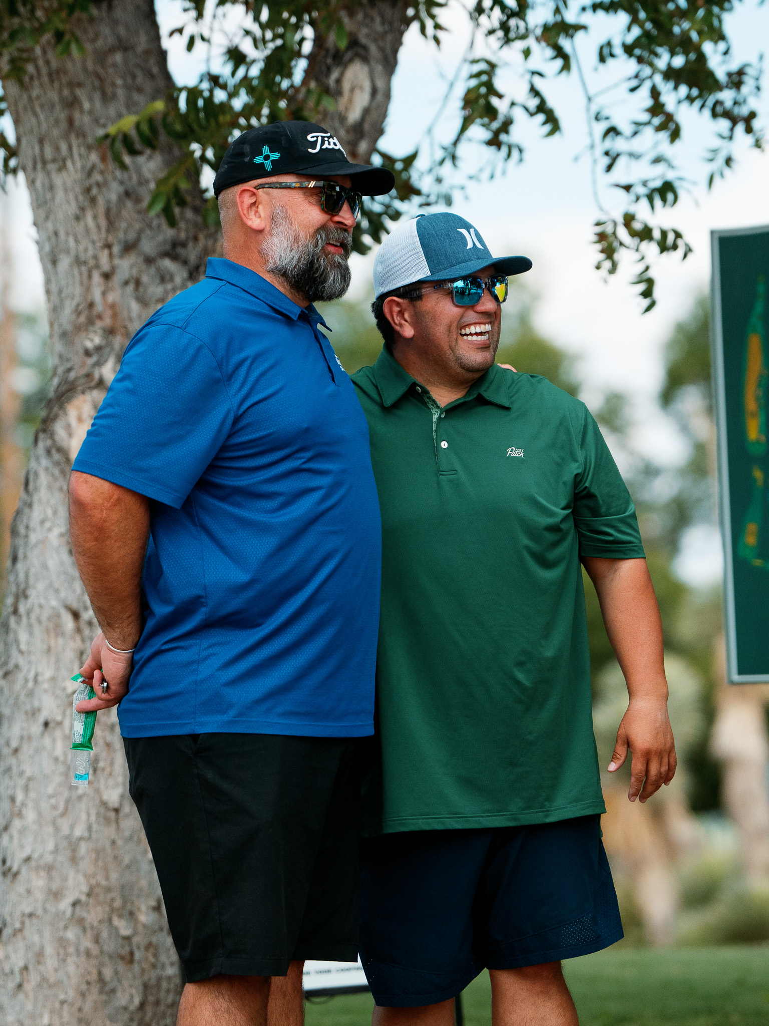 Tournament golfers celebrating on the 18th hole