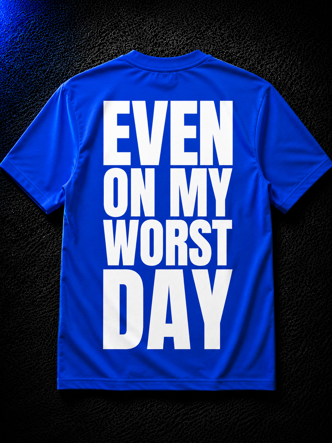 Status+ x E.O.M.W.D.  Blue T-Shirt — White Logo — back
