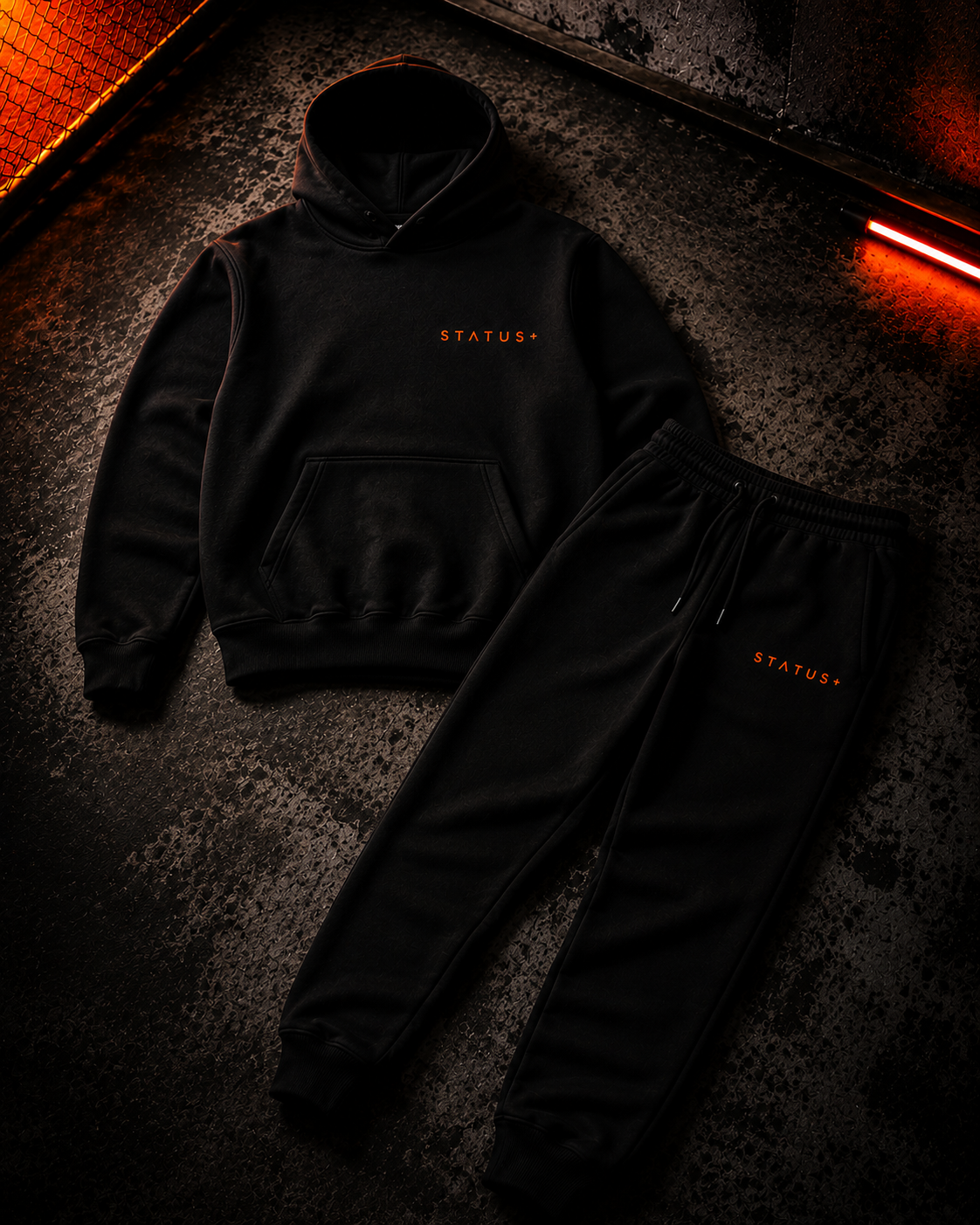 Status+ x E.O.M.W.D. Black Sweatsuit  — Orange Logo — front