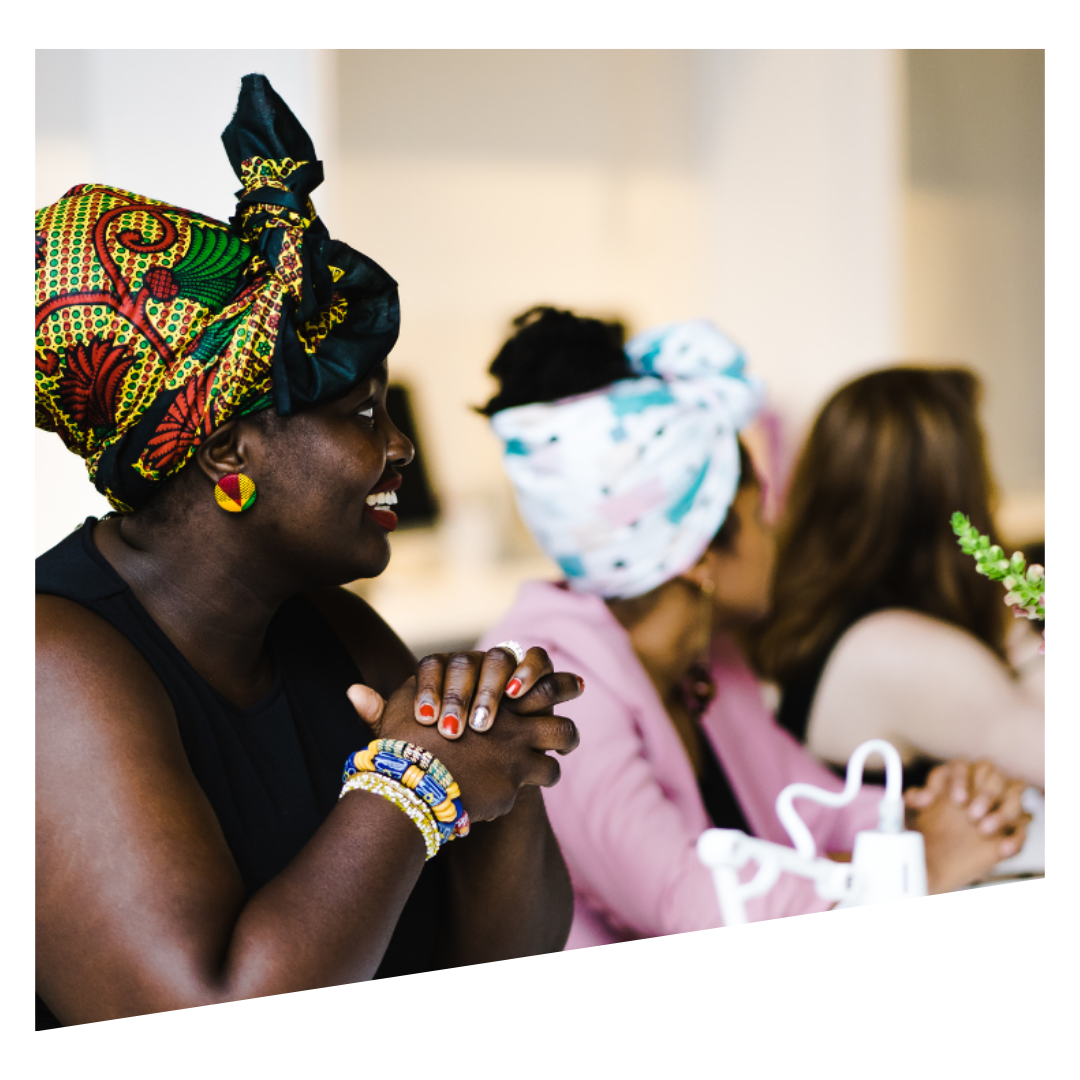 woman jumping towards water wearing life vest