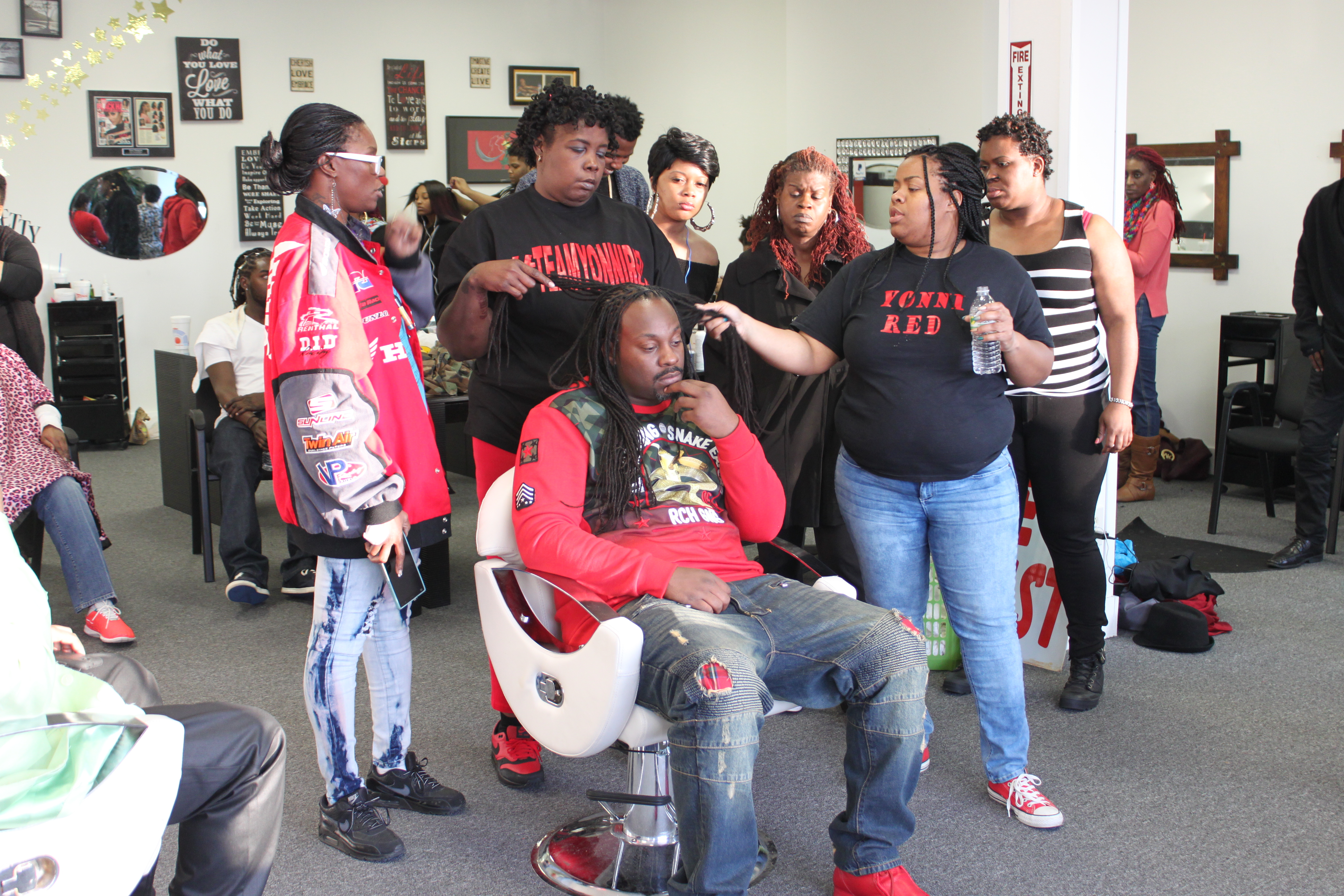 Yonni Red working and teaching in her salon