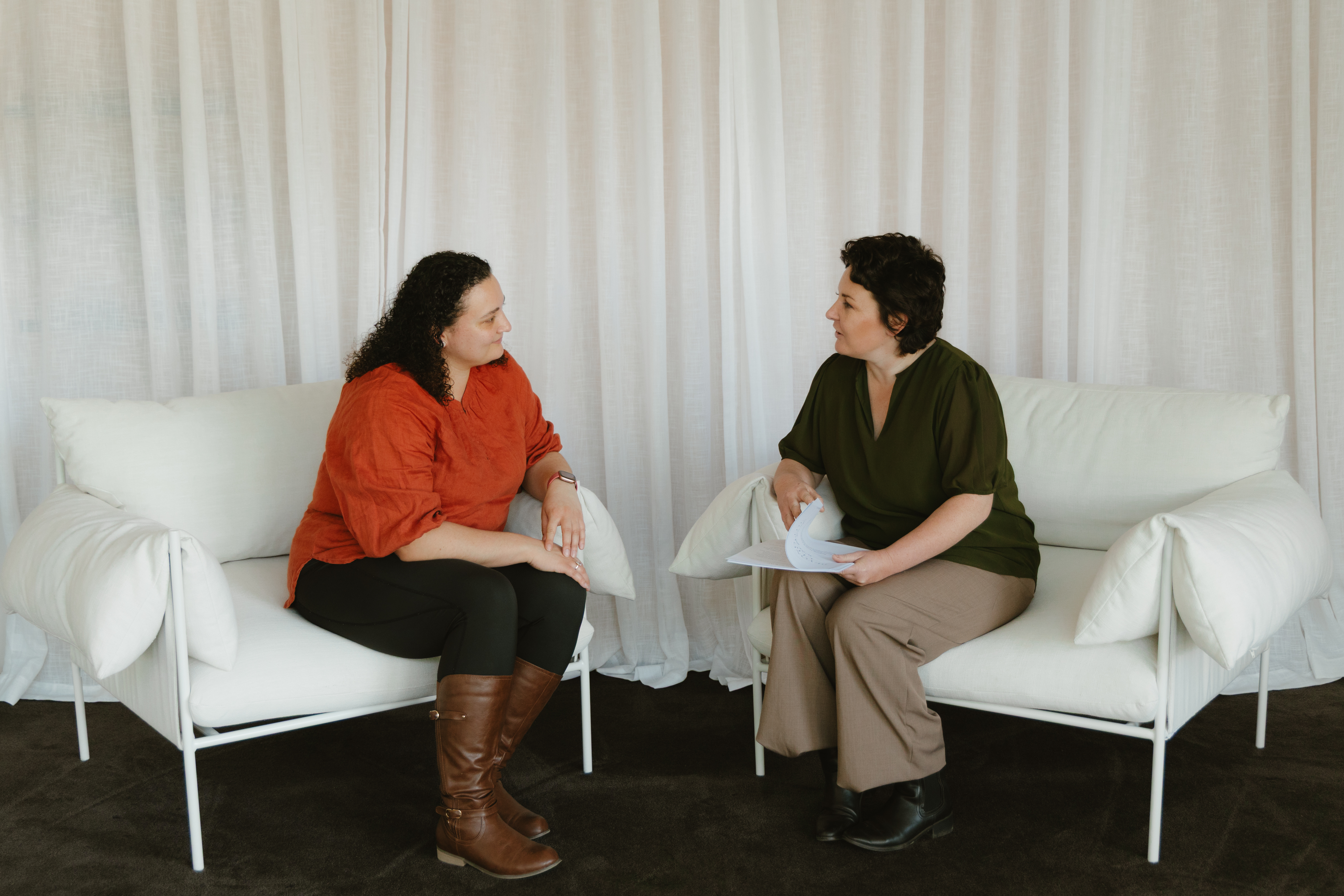 educator and student talking with eachother