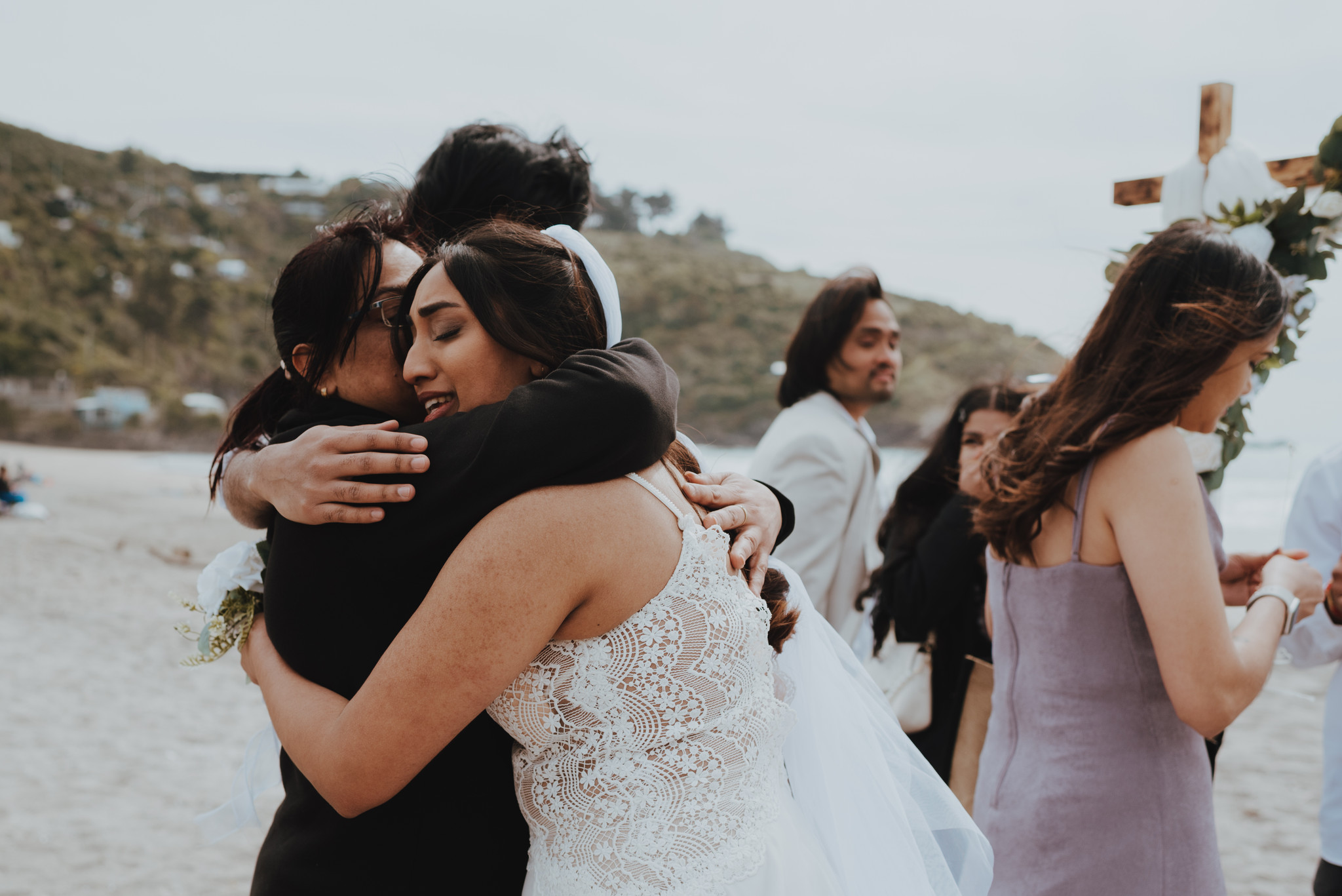 bride and her mother crying and hugging
