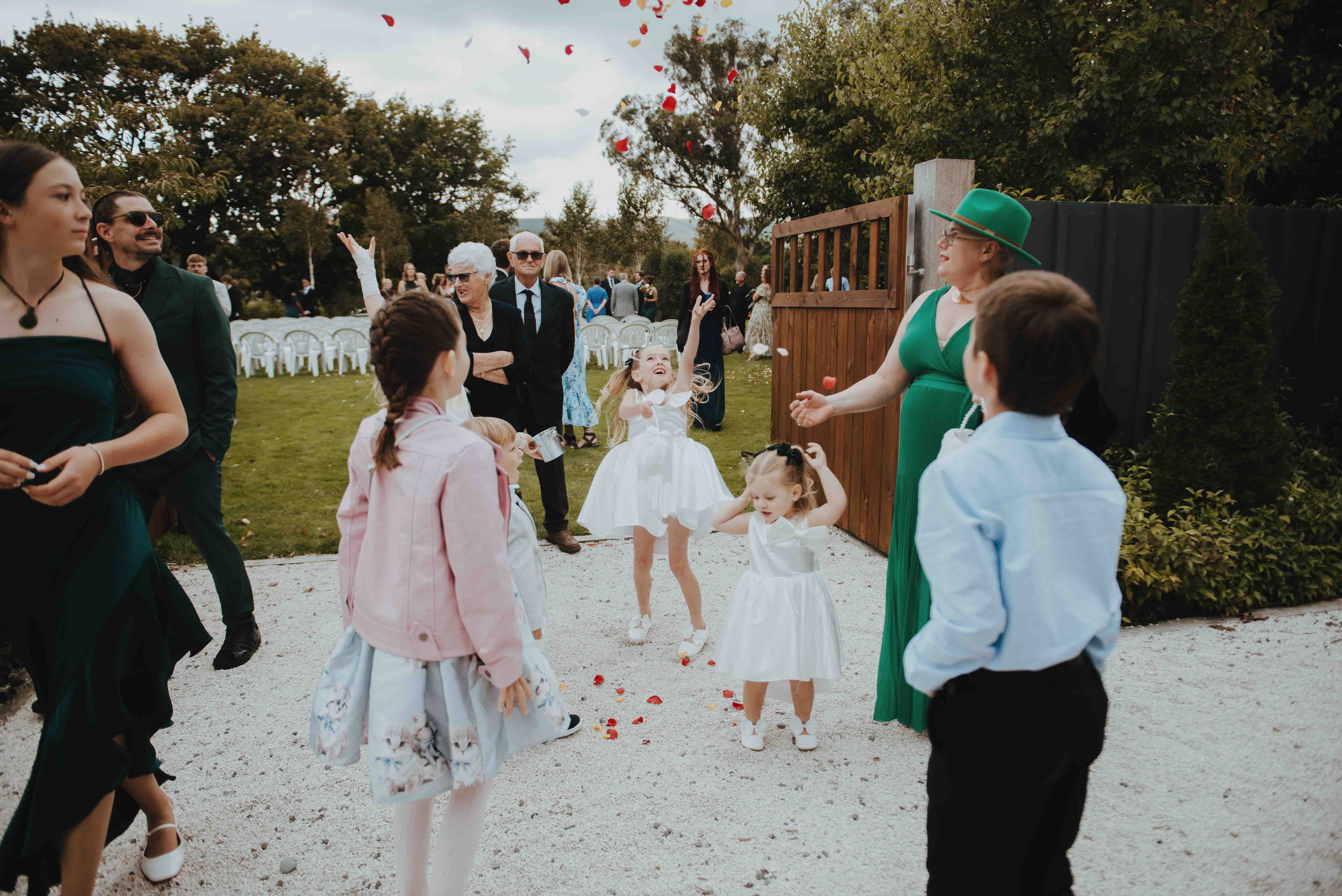kids playing and jumping at a tai tapu hotel wedding