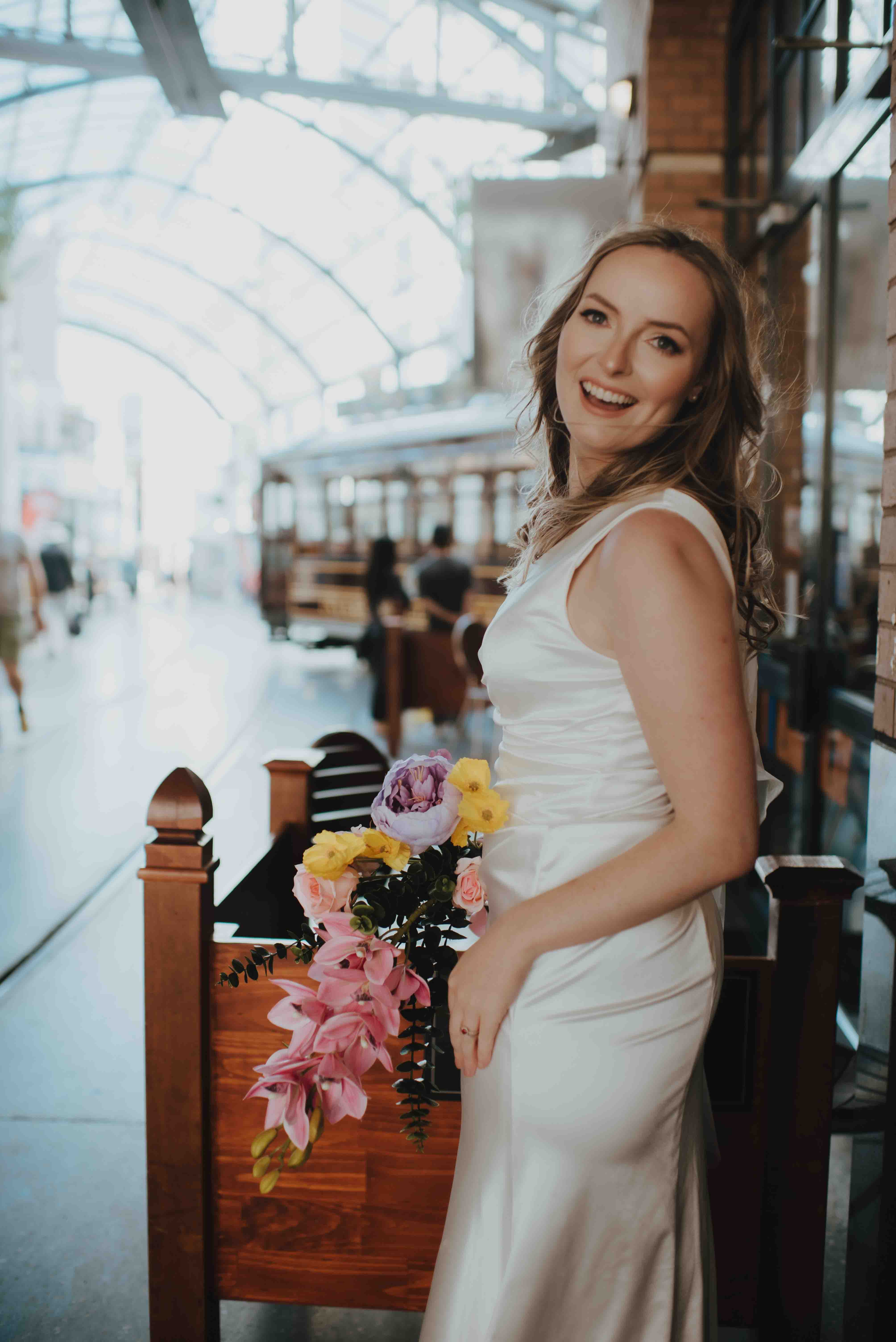 bride with tram in the background