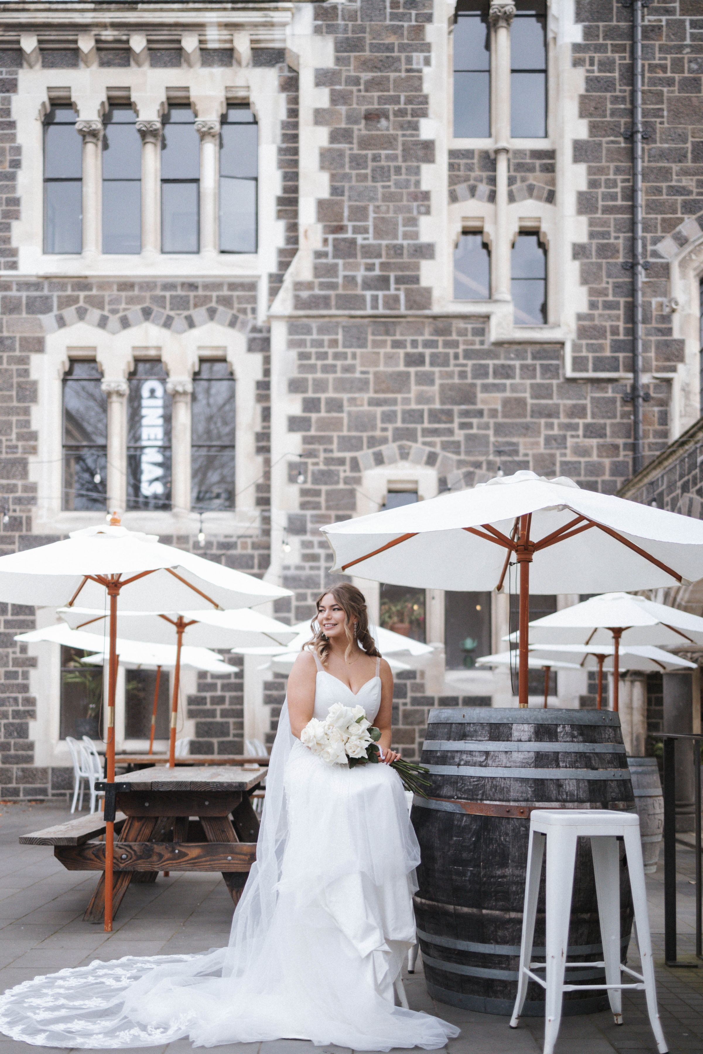 model smiling in the arts centre for bridal photoshoot
