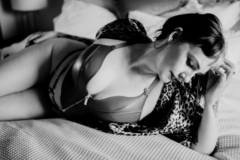 lying down pose for gender neutral boudoir photoshoot