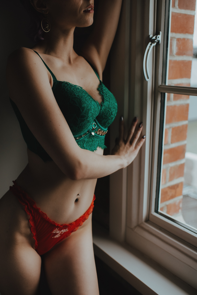 close up mid-riff shot of female wearing a lingerie set christmas themed