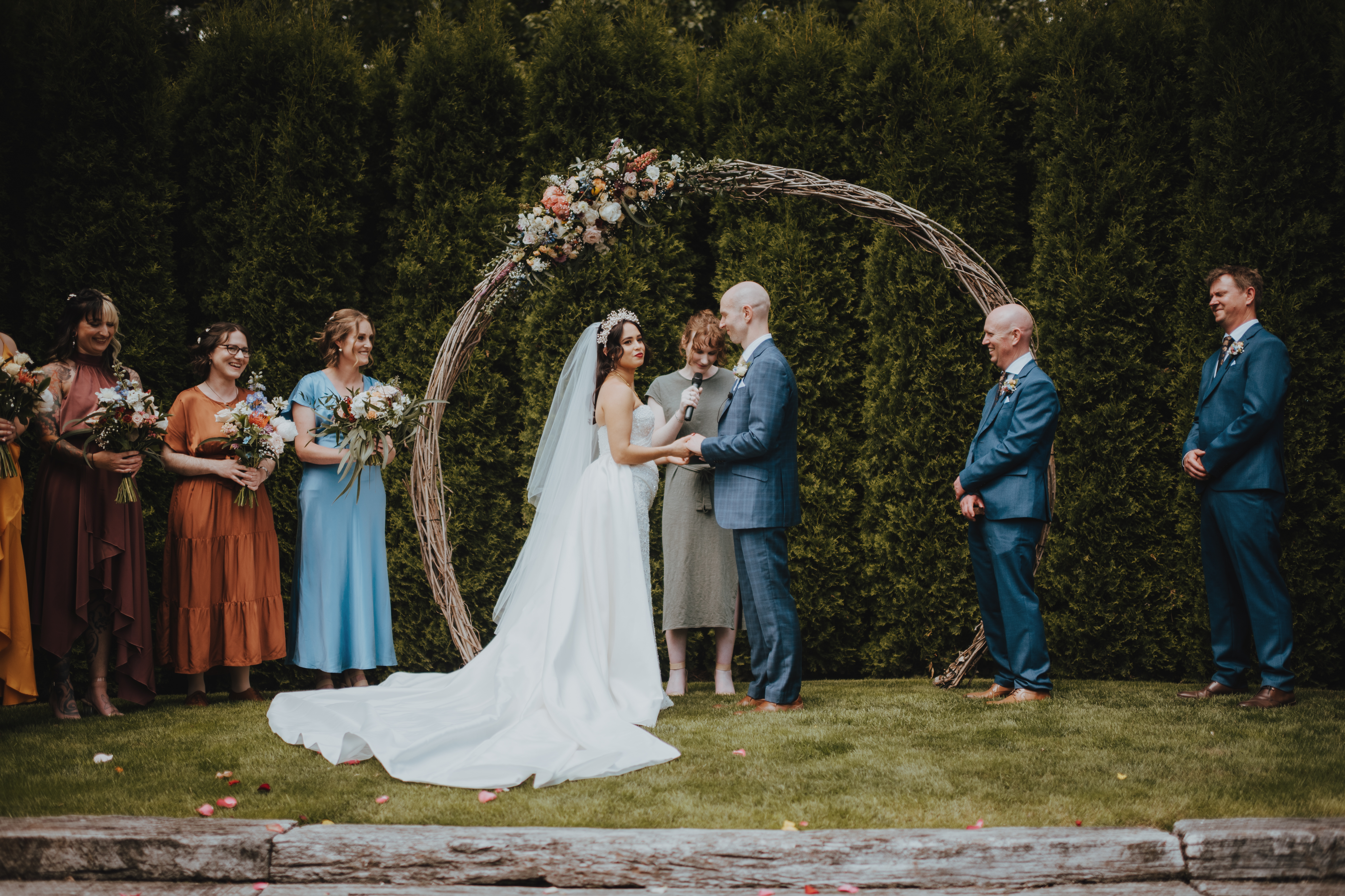 groom smiling and laughing with his bride groom smiling and laughing with his bride