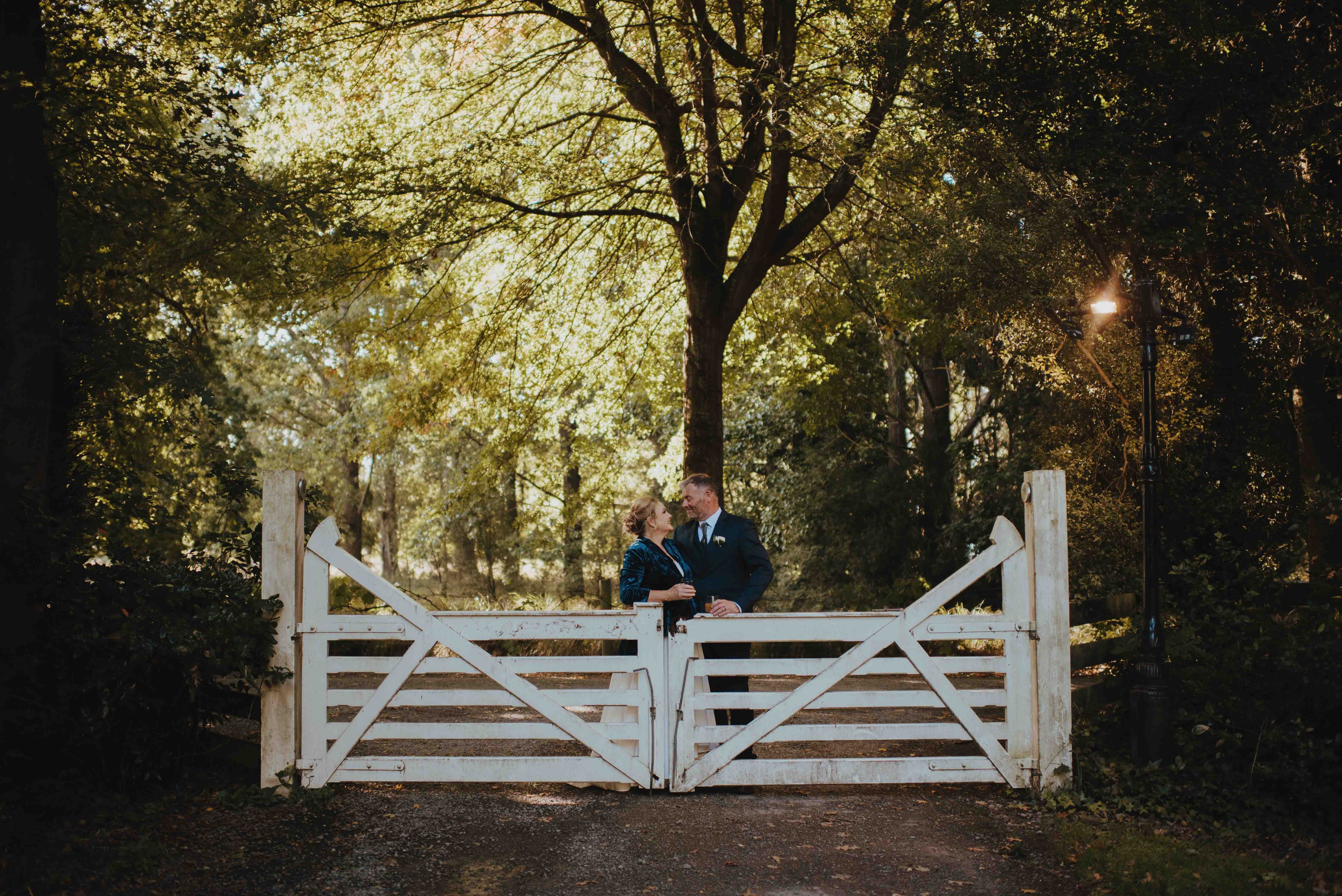 wedding portraits by the Pemberton front gate