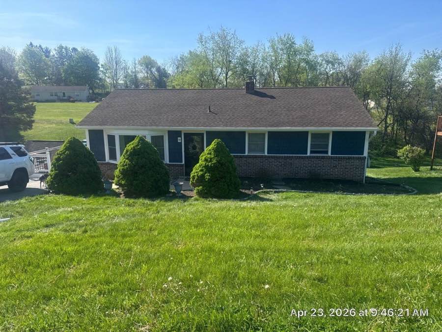 Completed siding project on ranch style home
