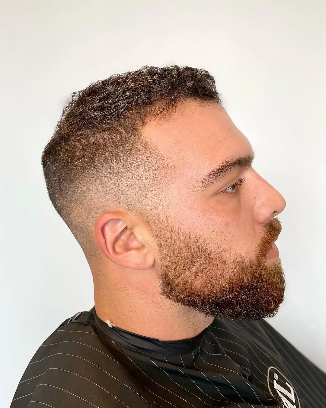 Men’s beard shaping and modern haircut by Cuts By Gage