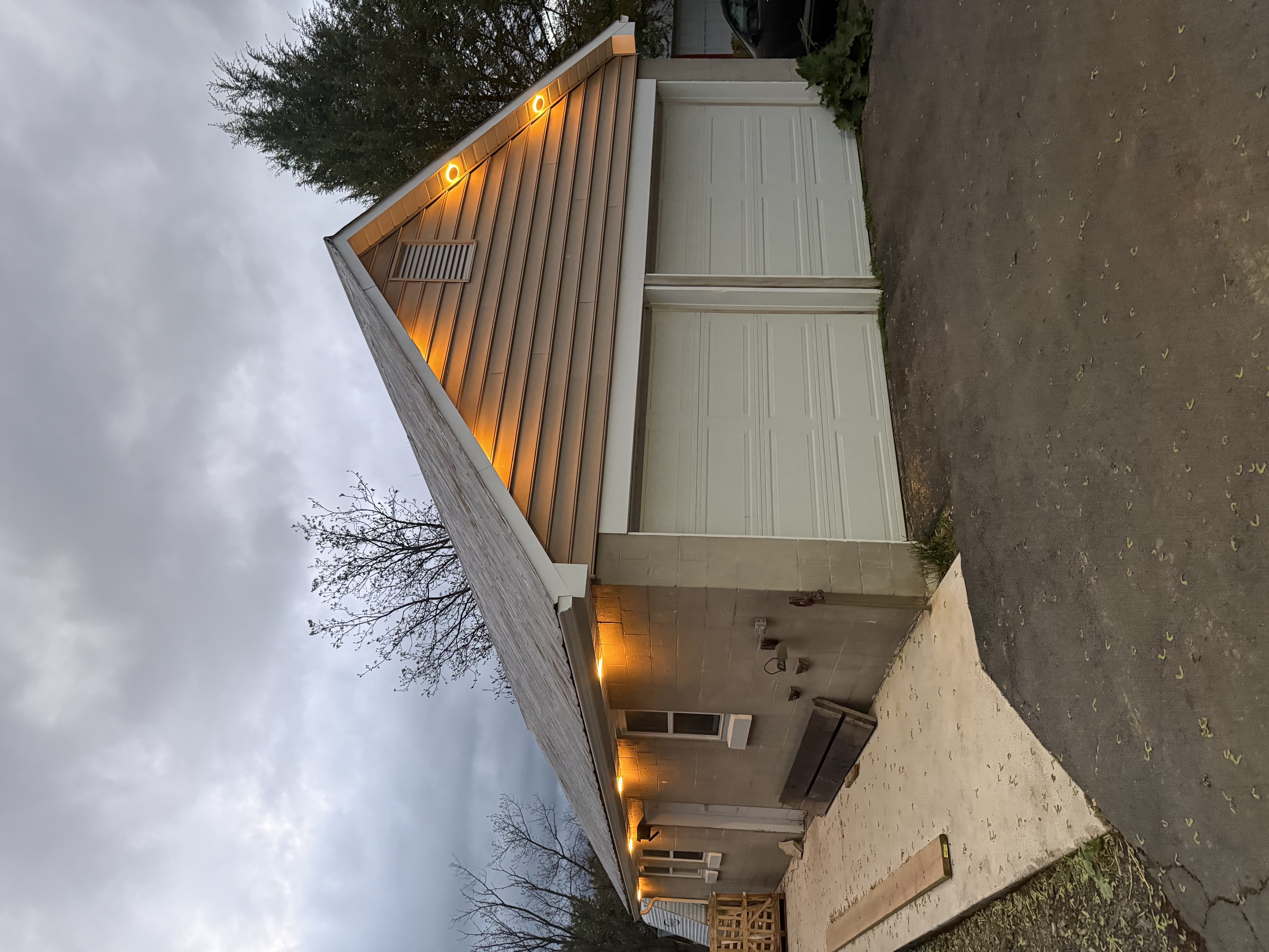Exterior soffit lighting lit up at dusk