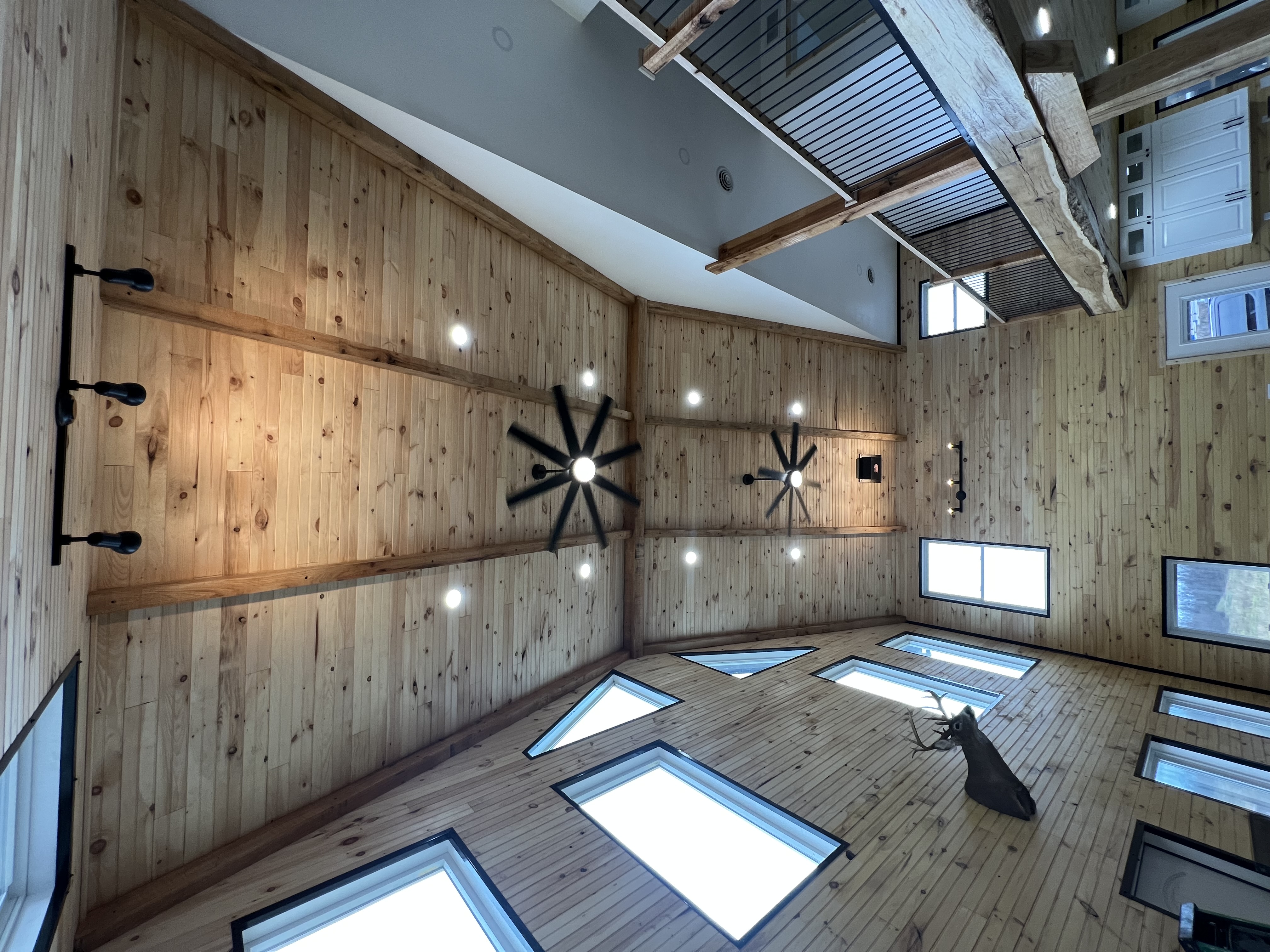 Recessed and cathedral lighting in a finished barndominium