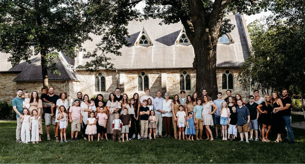 Gerry Hoisington and his large family in Faribault