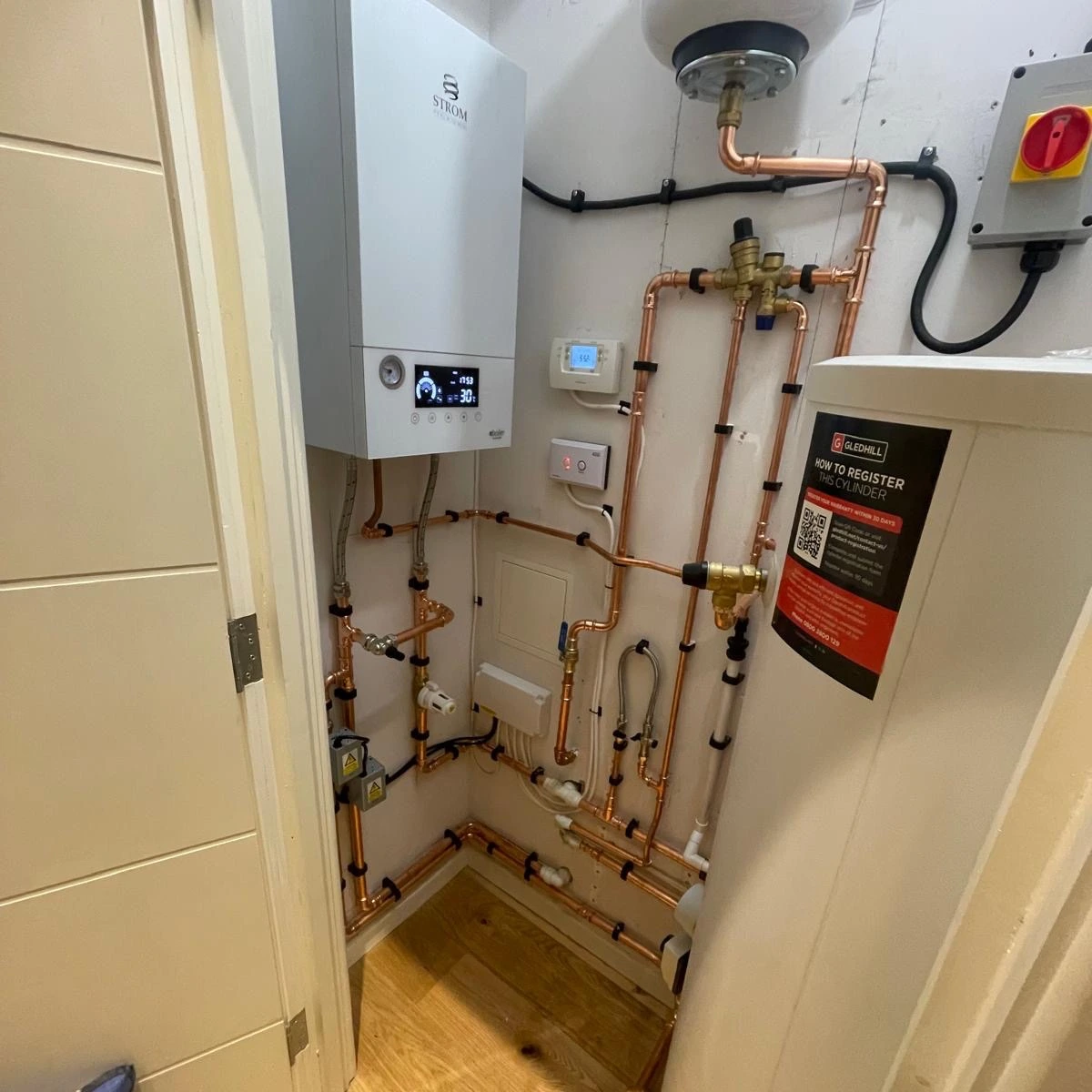 Gas engineer servicing a boiler