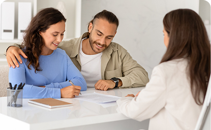 Home buyers discussing mortgage affordability
