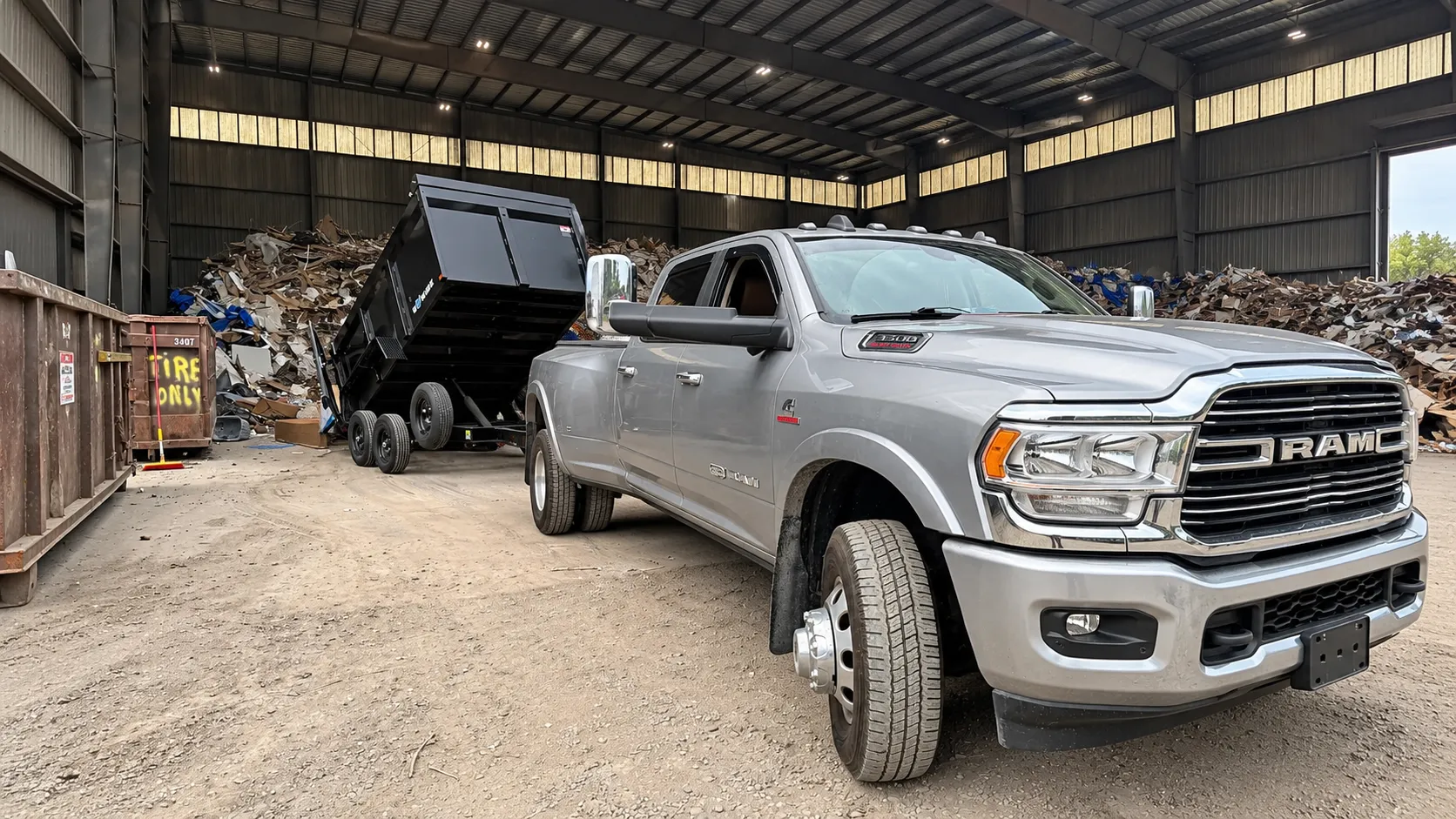 Dumpin' Loads LLC truck and dump trailer at the dump