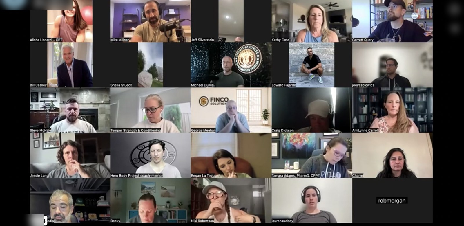 A live workshop room full of coaches