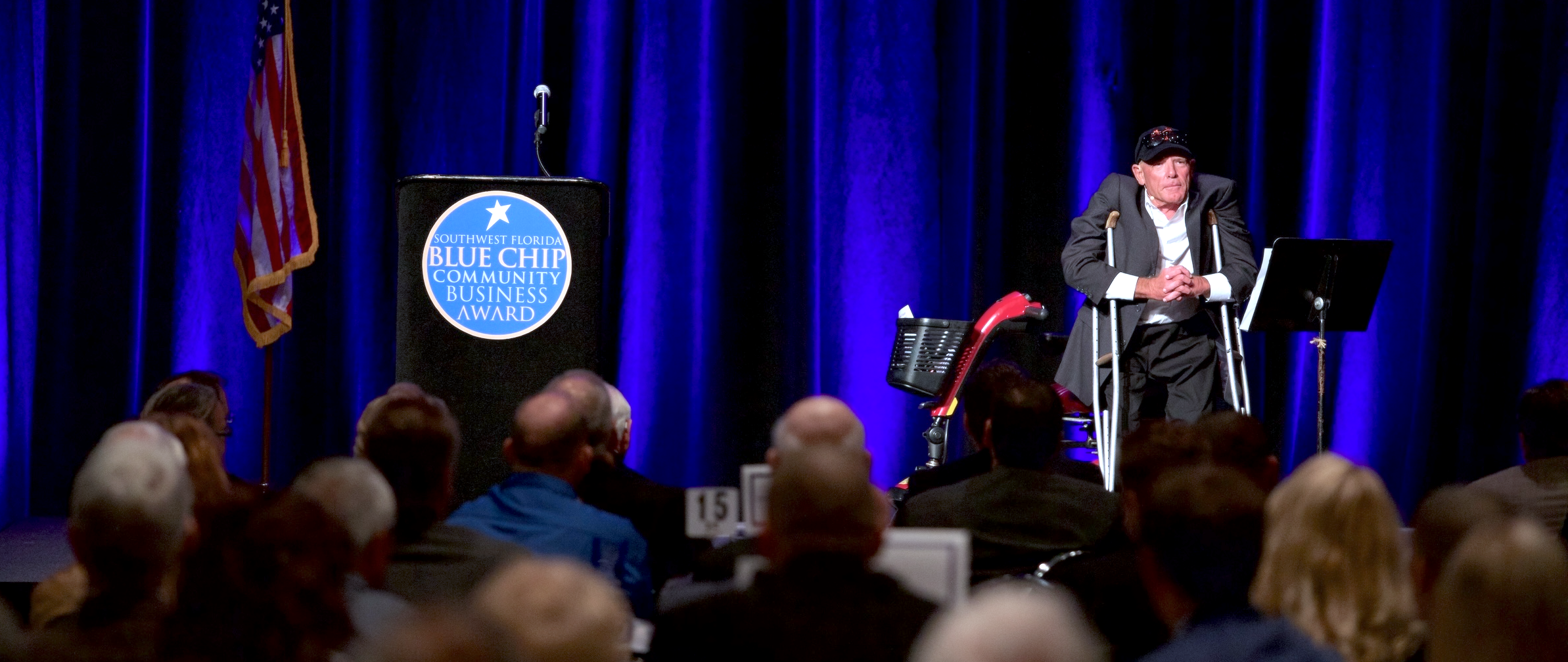 Dave Clark speaking on stage