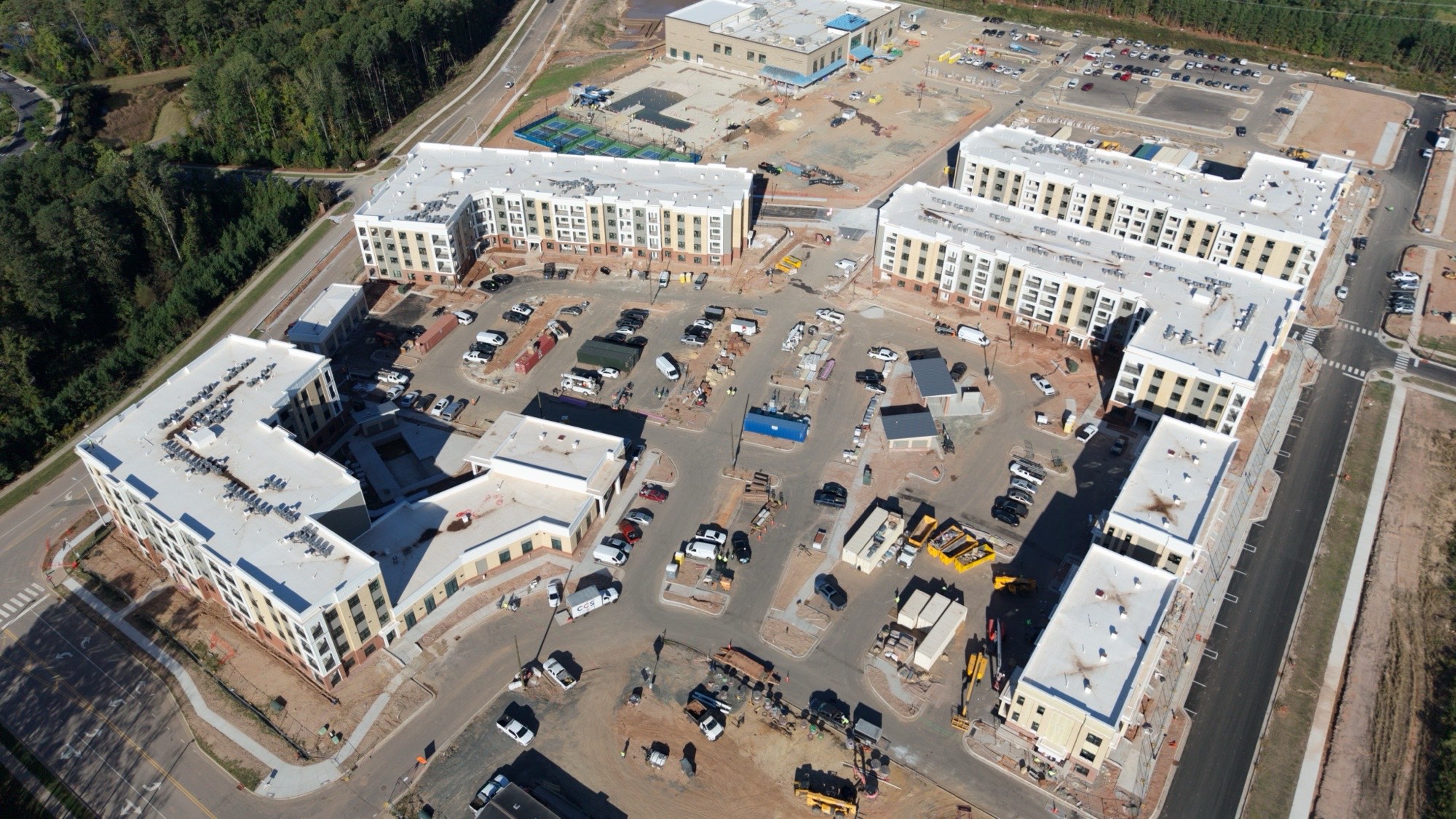 Aerial view of a multi-family development roofed by Central Carolina Roofing Systems