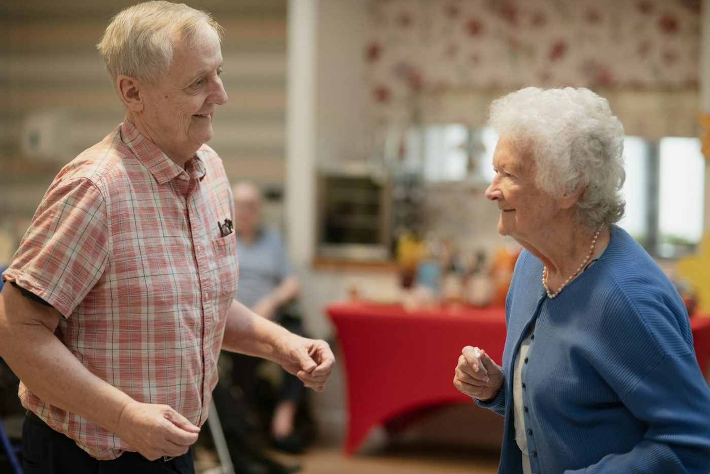Older couple dancing and laughing together