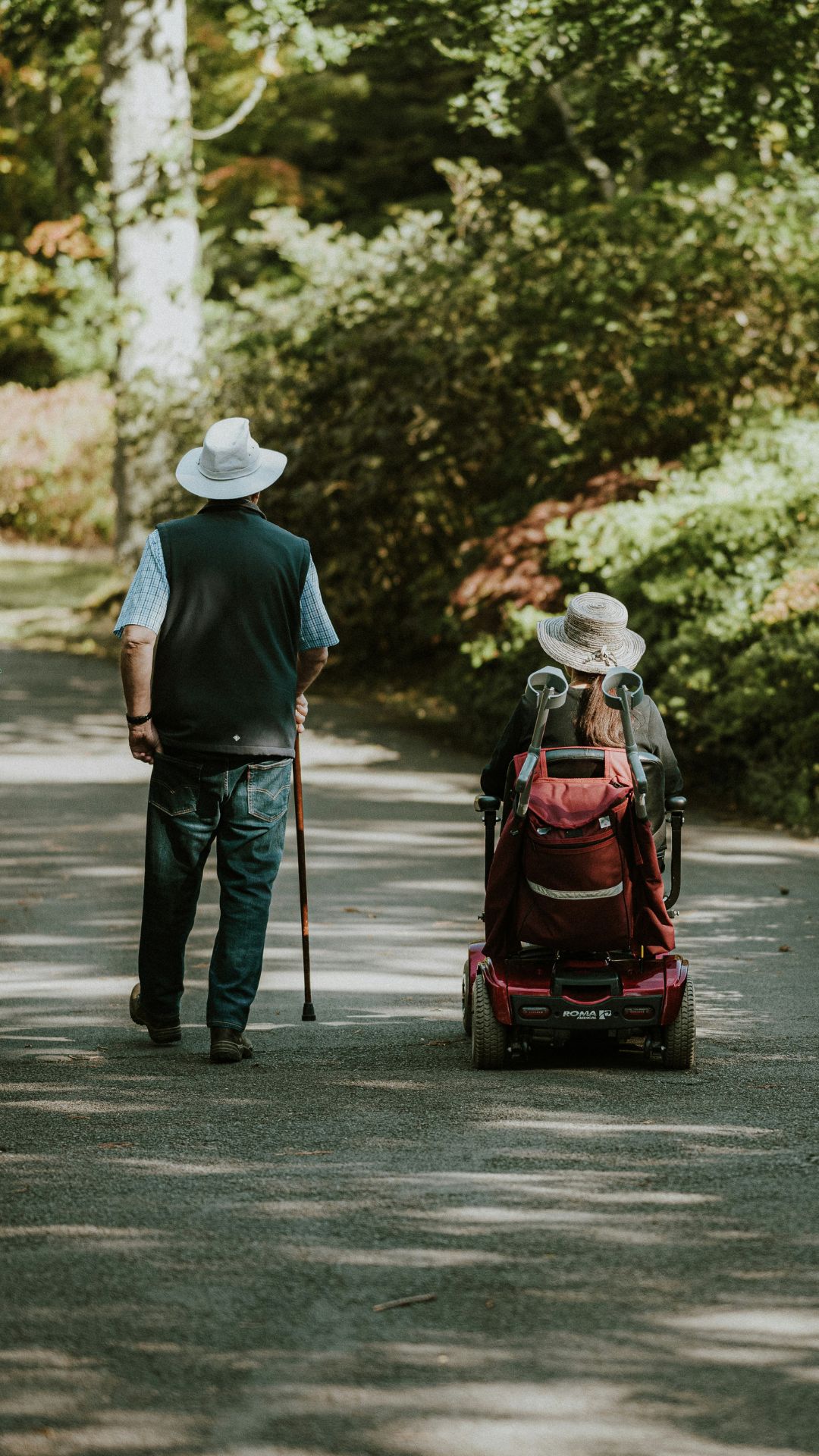 disability couple on a walking path