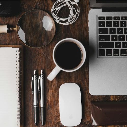 image of a table with devices on it in order, showing discipline