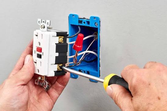 Electrical contractor at work