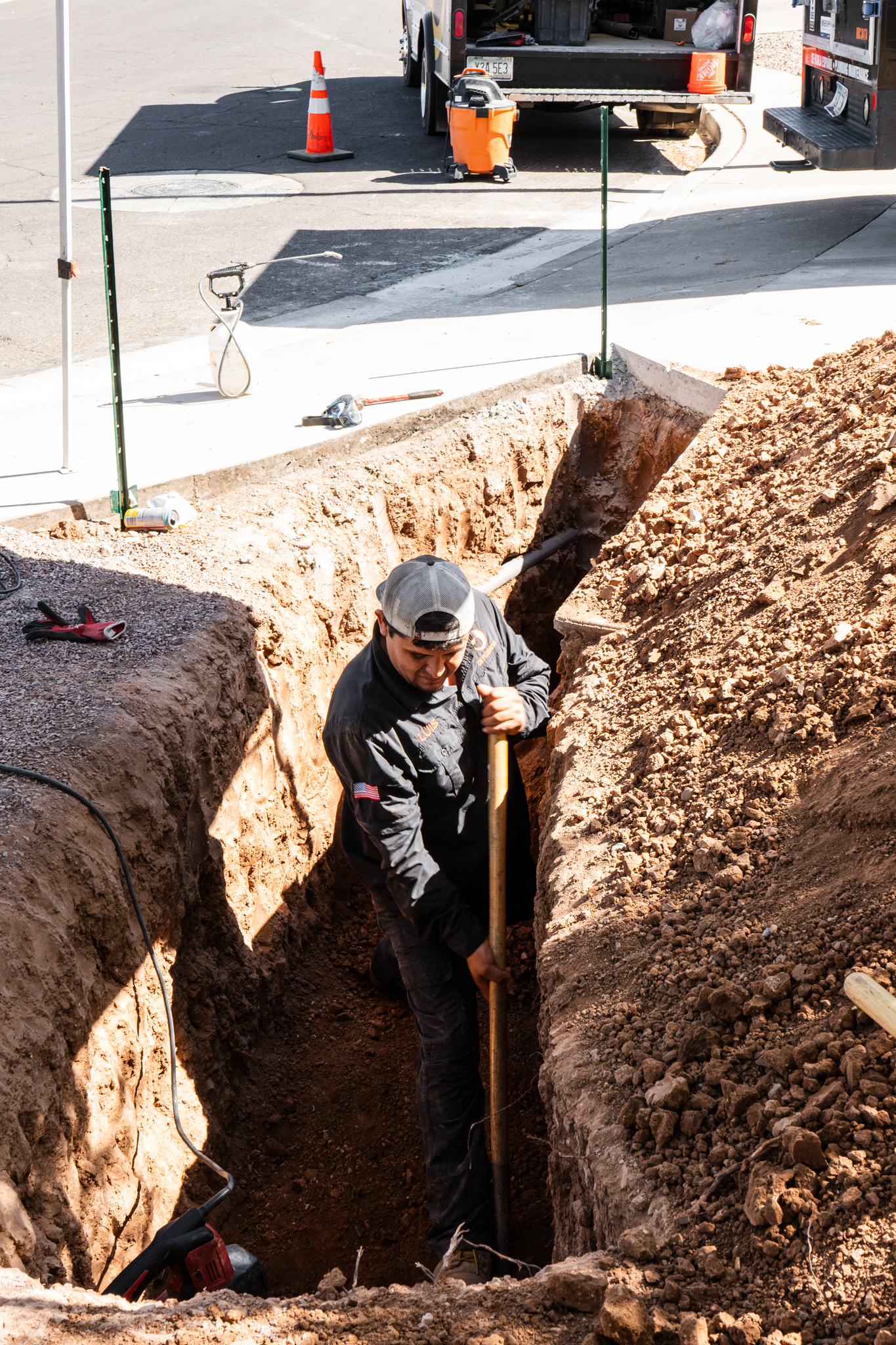OX Plumbing team member working on drain replacement