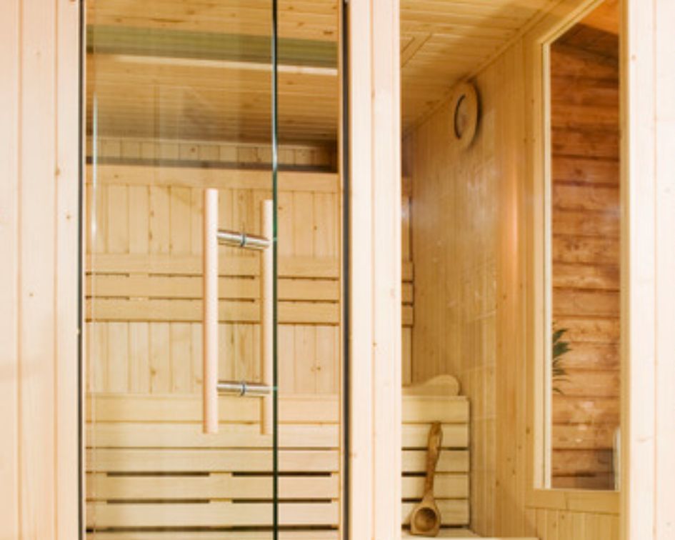 Pre-built sauna structure for residential installation