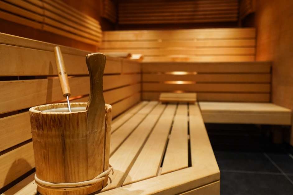 Traditional wood sauna interior with custom seating