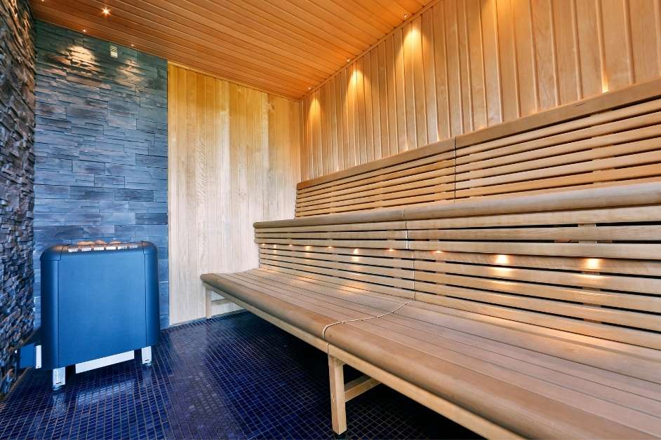 Large custom sauna interior for high-use environment