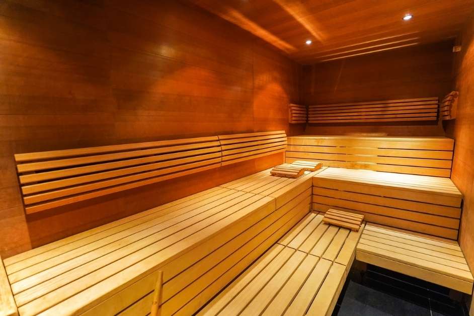 Large commercial sauna with tiered seating