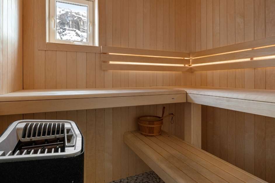 Custom sauna interior with multi-level wood benches