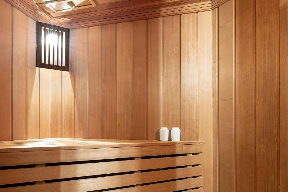 Wood interior and seating in a custom indoor sauna