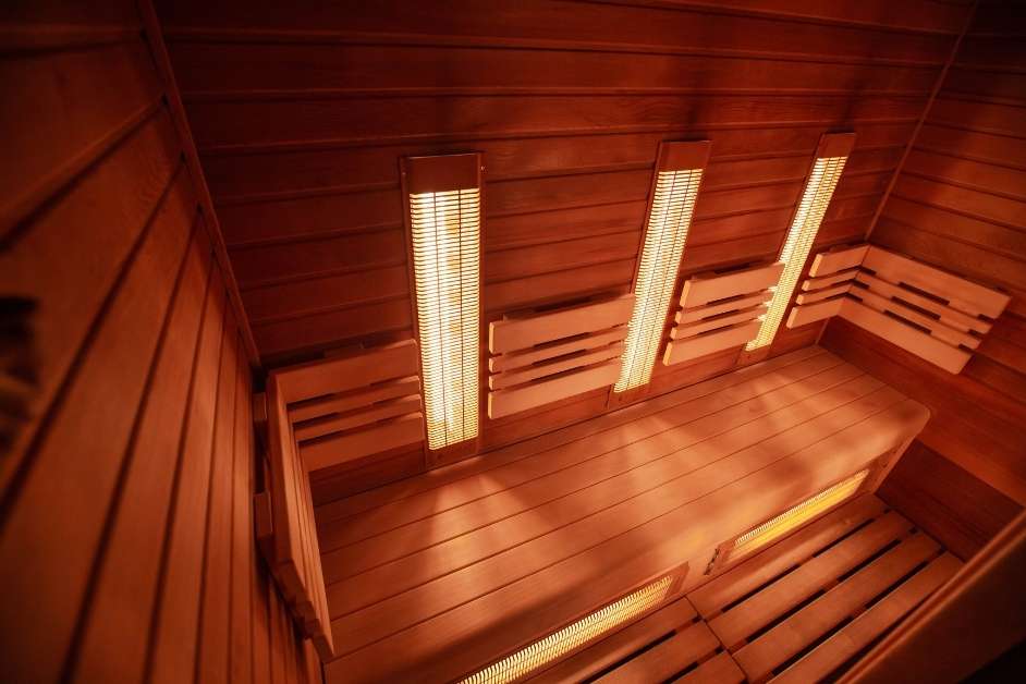 Custom infrared sauna with illuminated heat panels