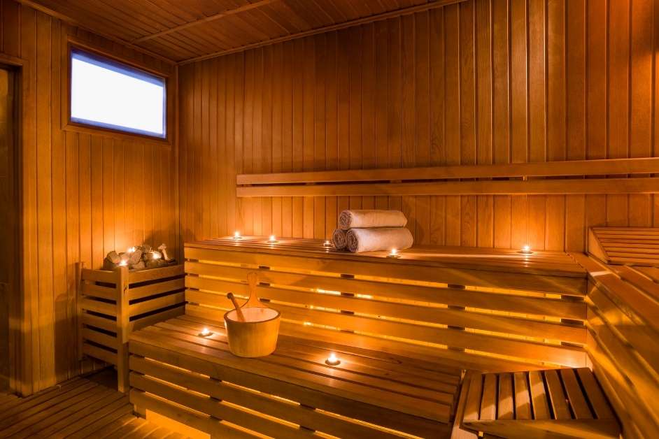 Traditional wood sauna with custom bench configuration