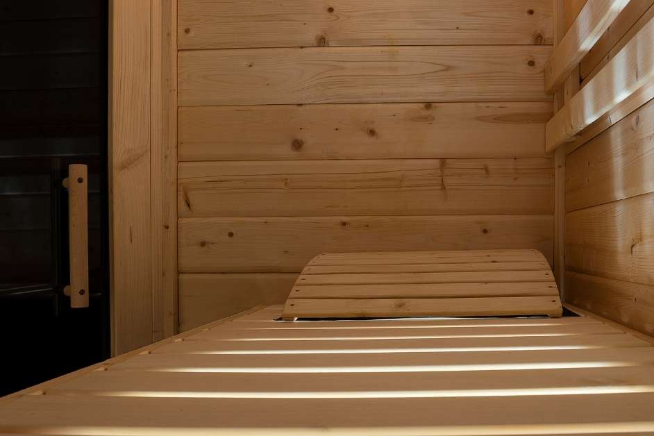 Custom wood sauna with contemporary bench design
