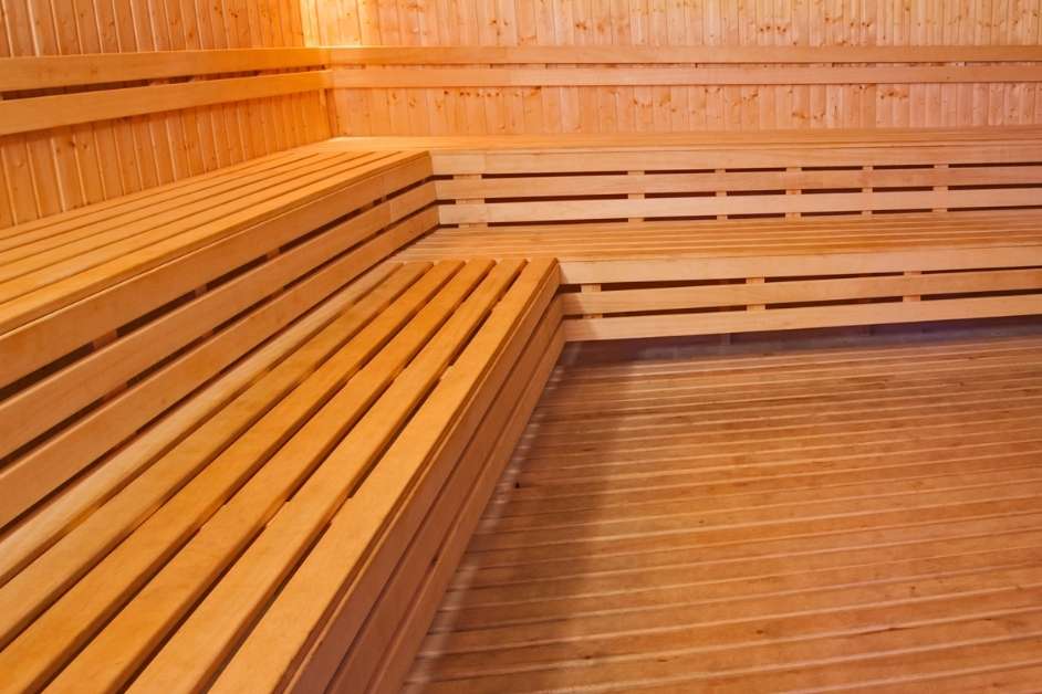 Traditional indoor sauna with custom wood interior