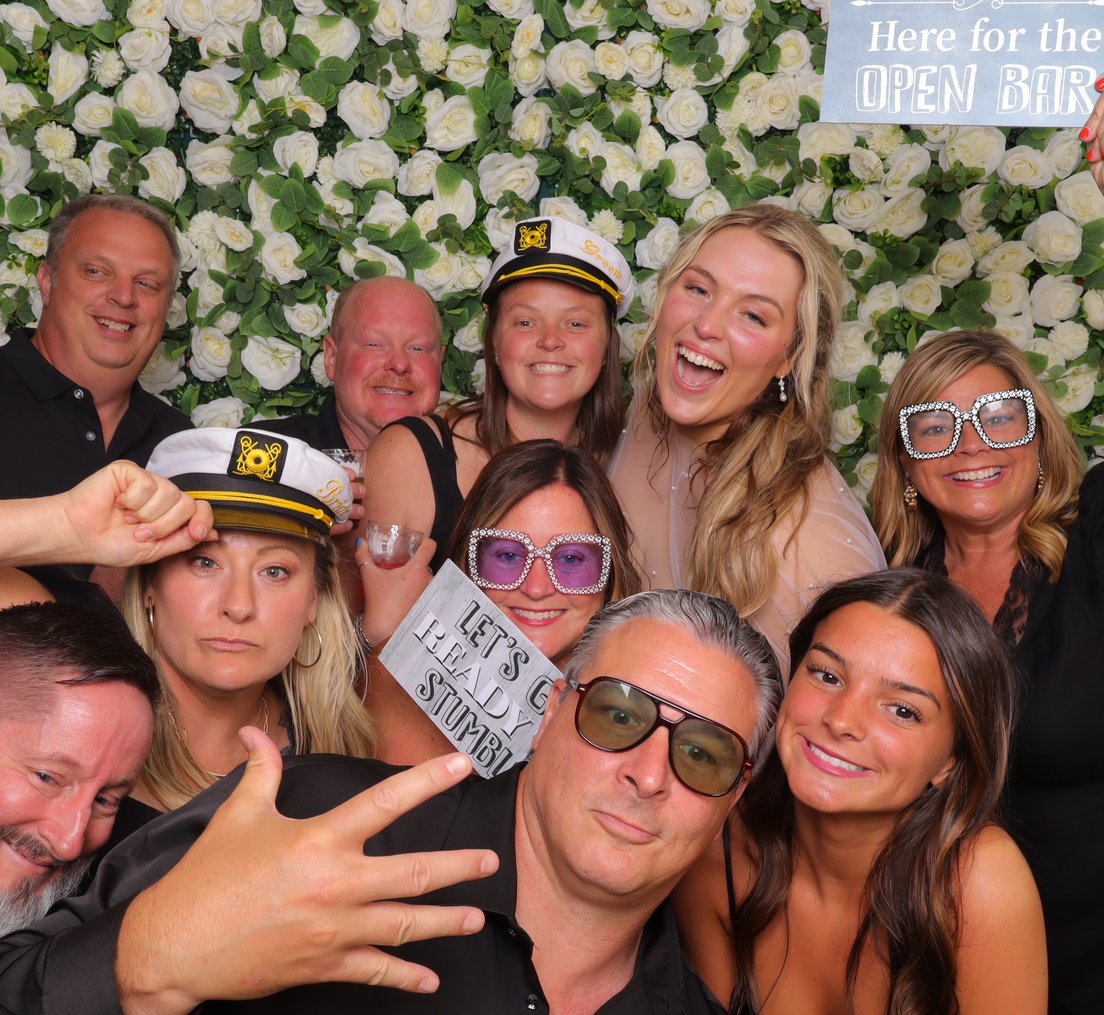 Group of friends laughing and having fun at a Photo-N-Go celebration event