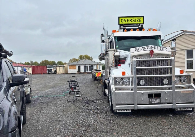 Clean delivery truck reflecting sunlight after premium wash in Auckland