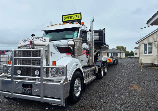 Shiny chrome grille on a freshly cleaned semi-truck by Auckland's Hard and Fast Detailing