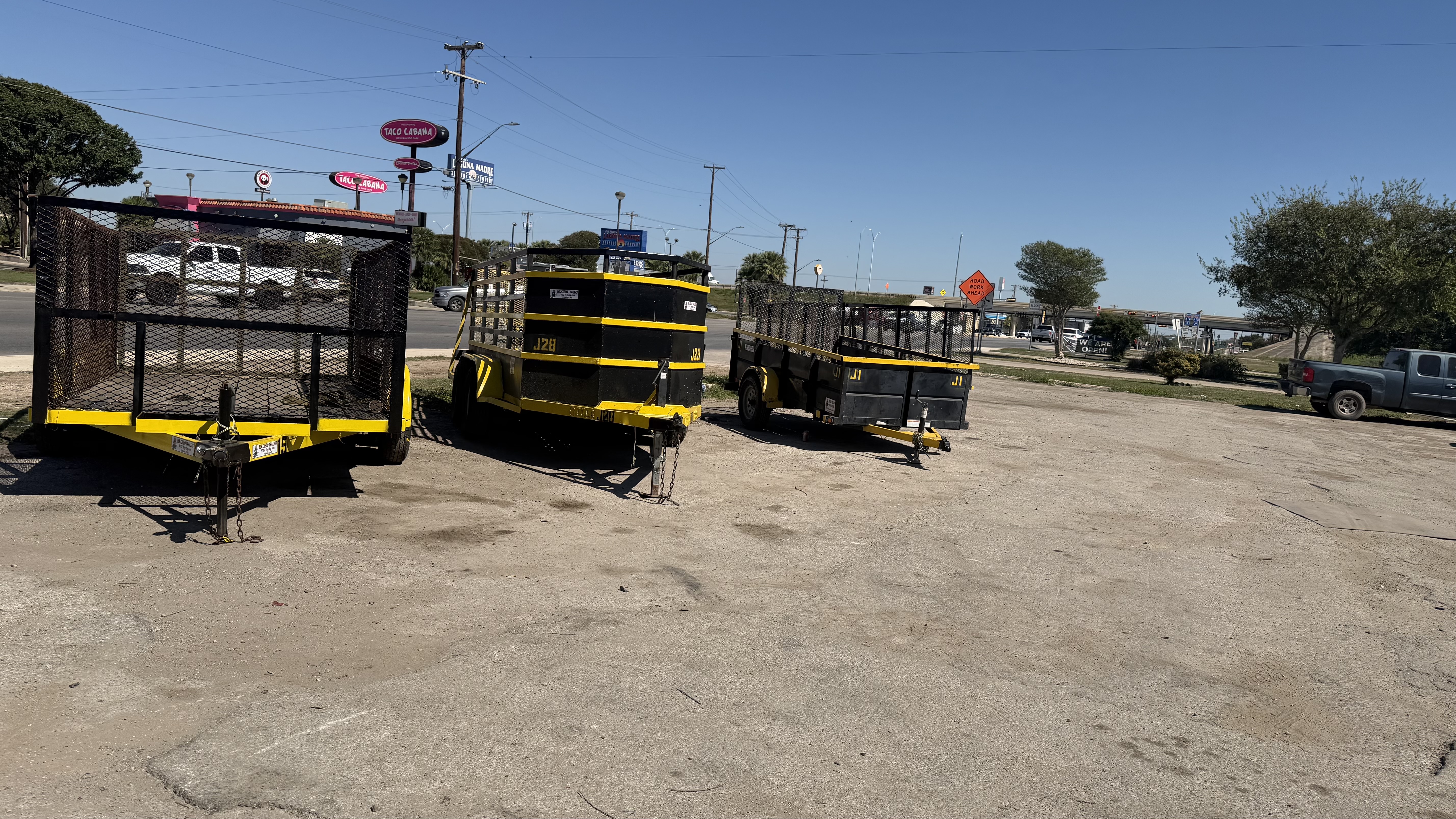 Utility and dump trailers available to rent on the yard at Mr. Cielo Trailers