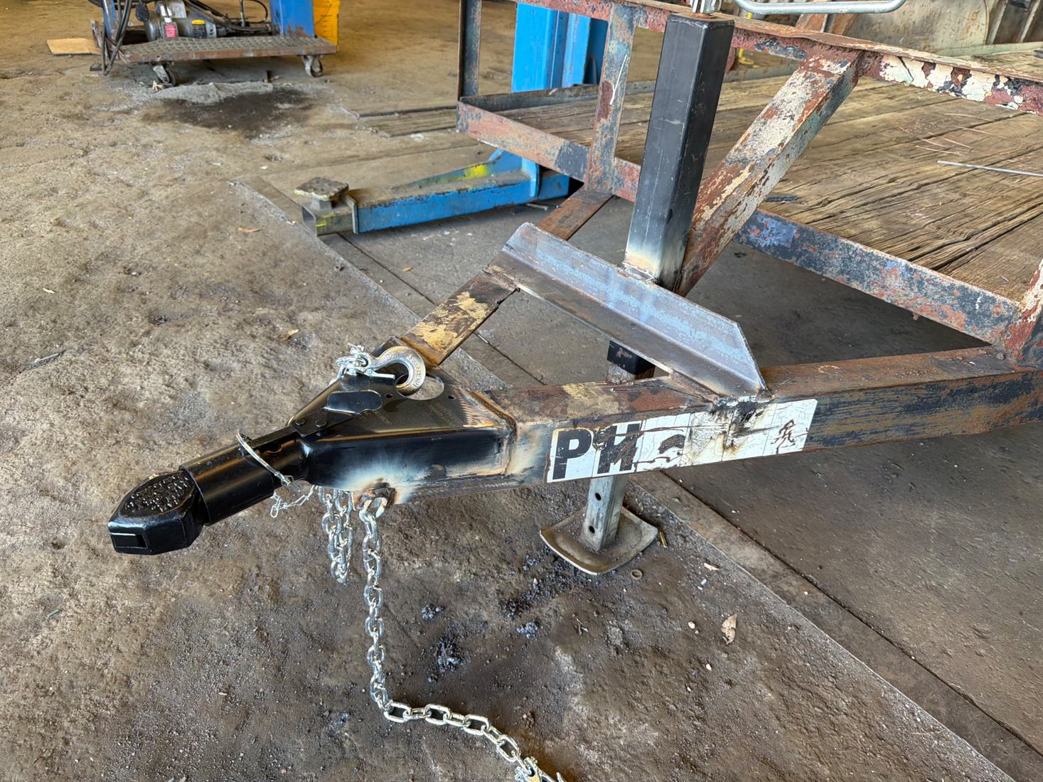 New A-frame tongue and coupler welded onto a utility trailer at Mr. Cielo Trailers