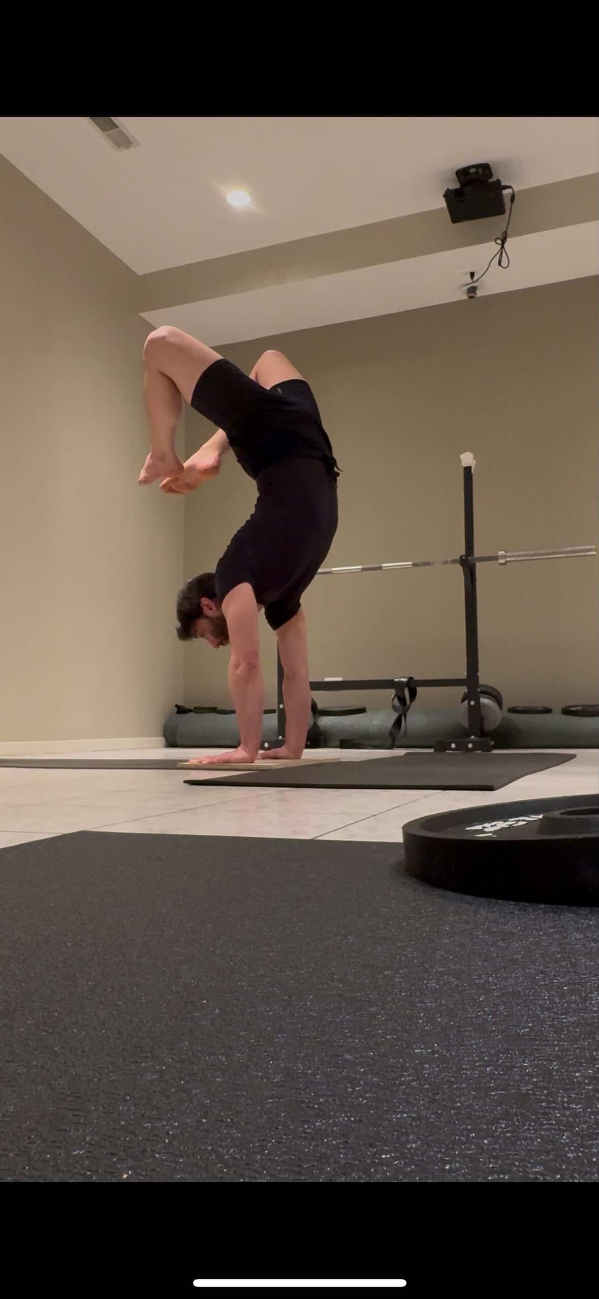 Greg holding an advanced pose