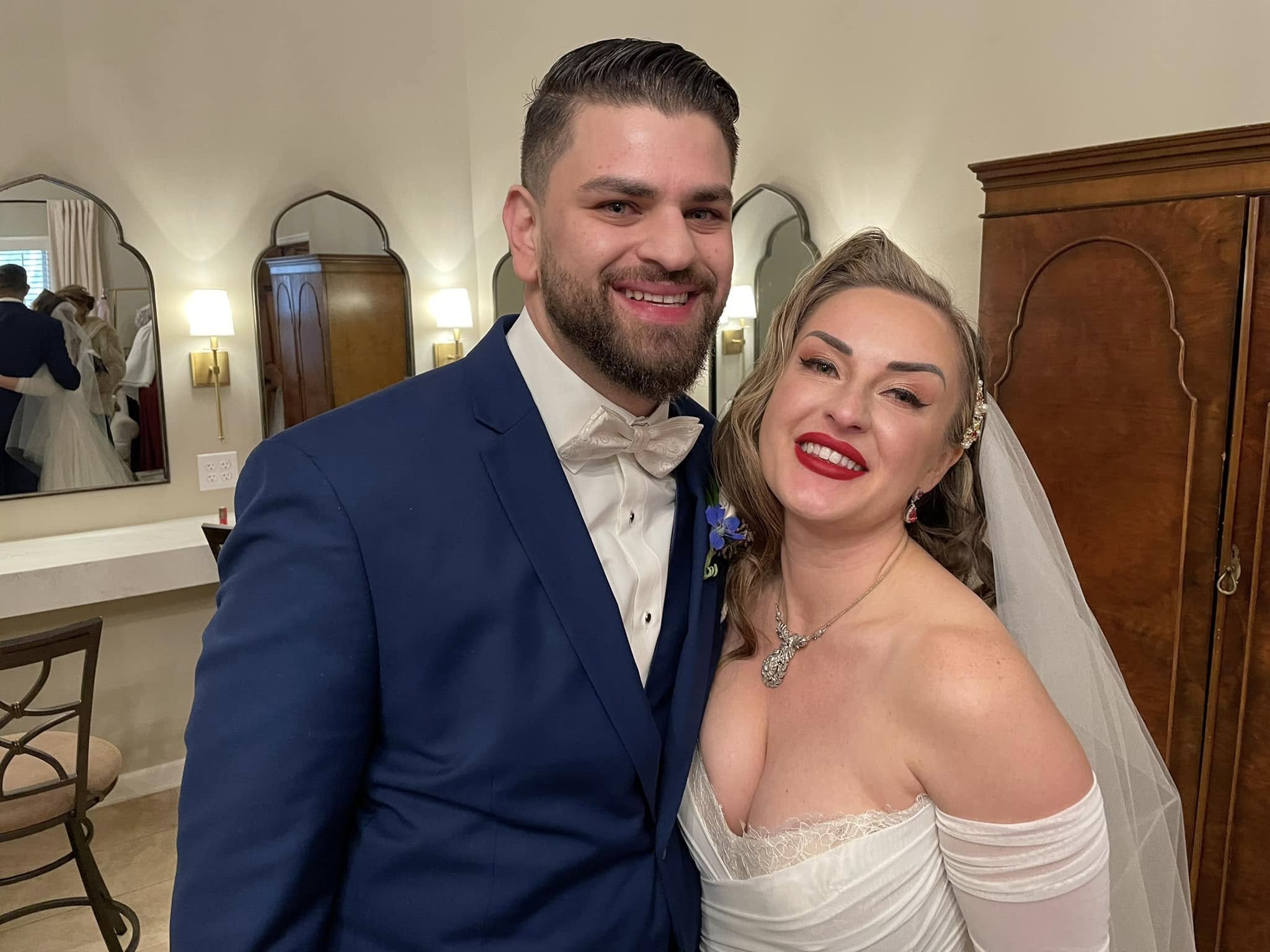 Smiling bride and groom