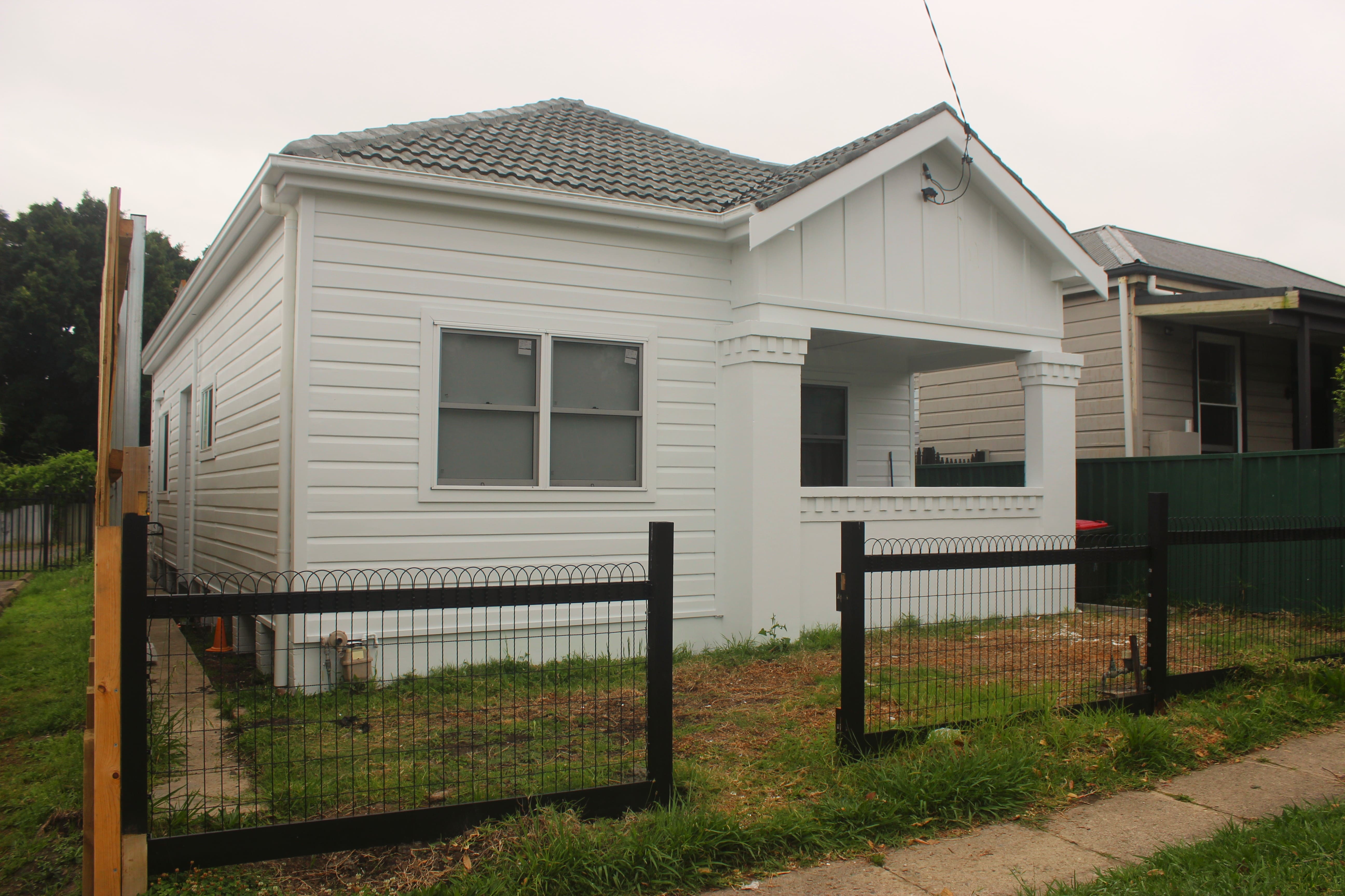 Home renovation and exterior cladding work by Ping Building Projects in Newcastle NSW