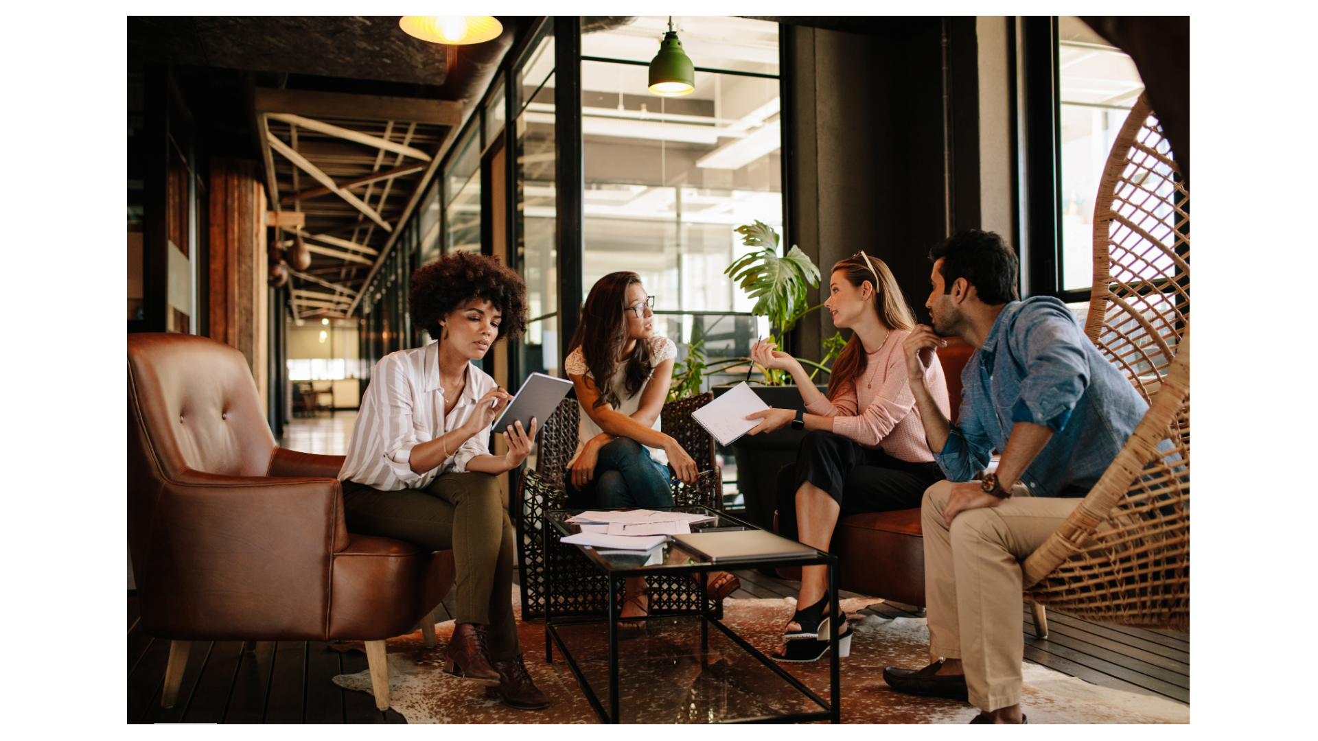 Black business professionals collaborating in a modern office environment