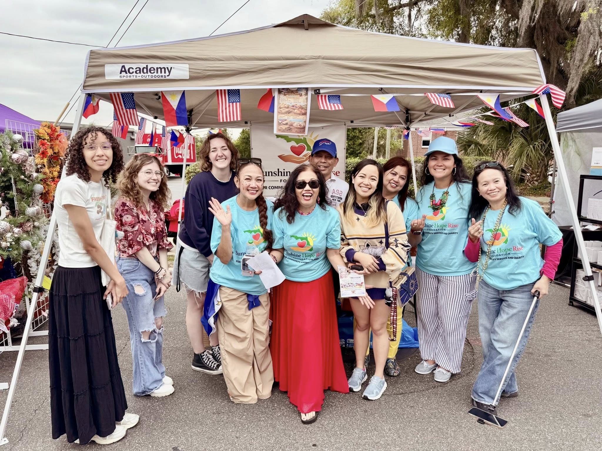 Sunshine Hope Rise volunteers gathered at a community event